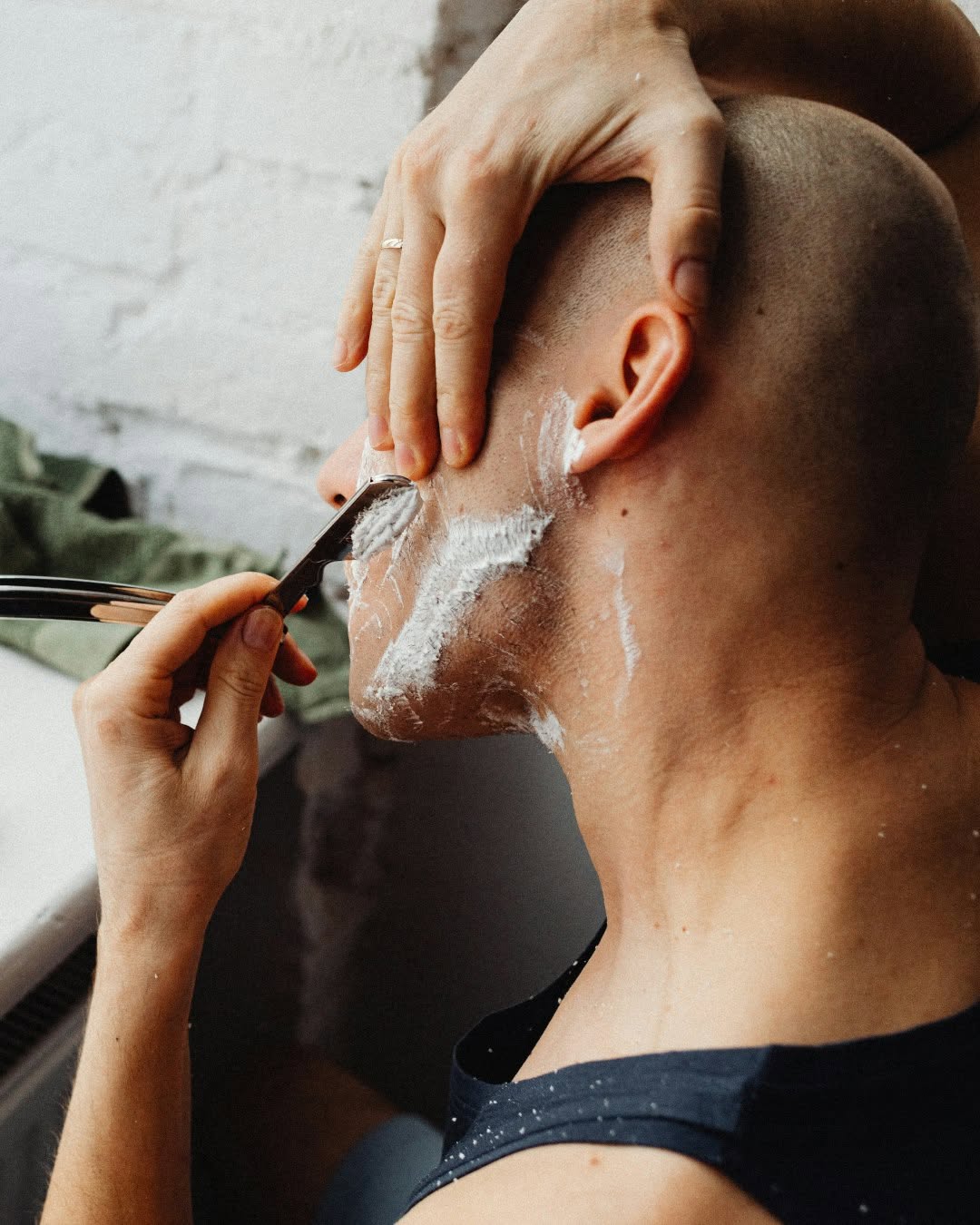 Instagram post by Dr. Marla M. Klein: Shave after your shower, not before 🪒 Warm water softens facial hair and opens the pores, helping your razor glide more easily and reducing…