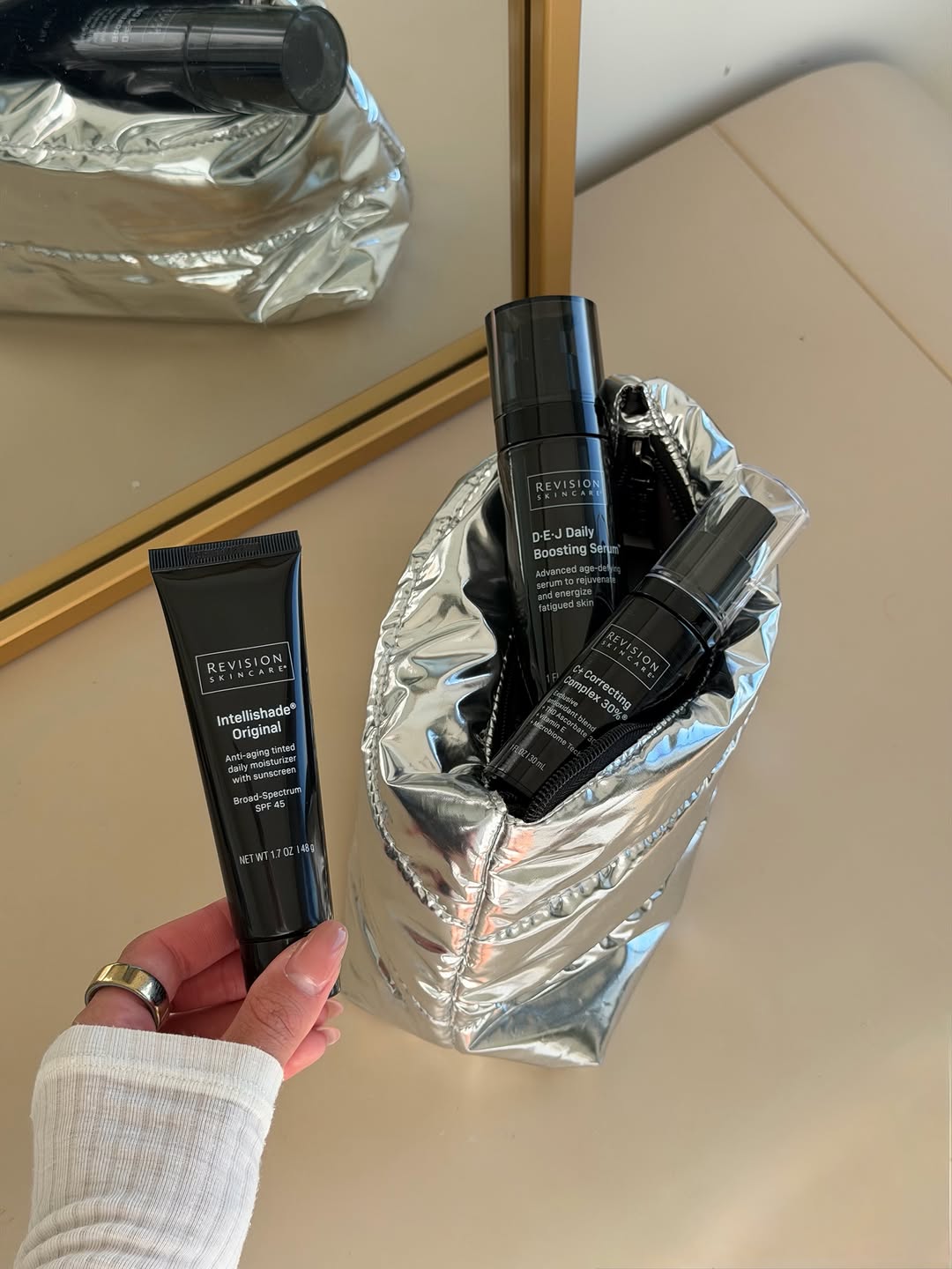 Instagram post by Dr. Mary M. Dobson: ✨ July Revision Skincare Special ✨ Stock up on your Revision Skincare favorites and receive a complimentary silver puffer travel bag filled …