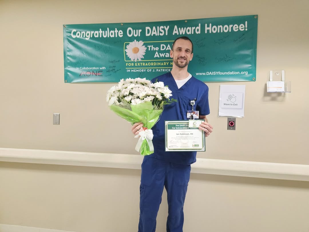 Instagram post by Dr. Michael (Mike) Choi: Congratulations to Ian Robinson, RN, ICU, on receiving a DAISY Award at Guthrie Cortland Medical Center! Ian was nominated by a nursing stud…