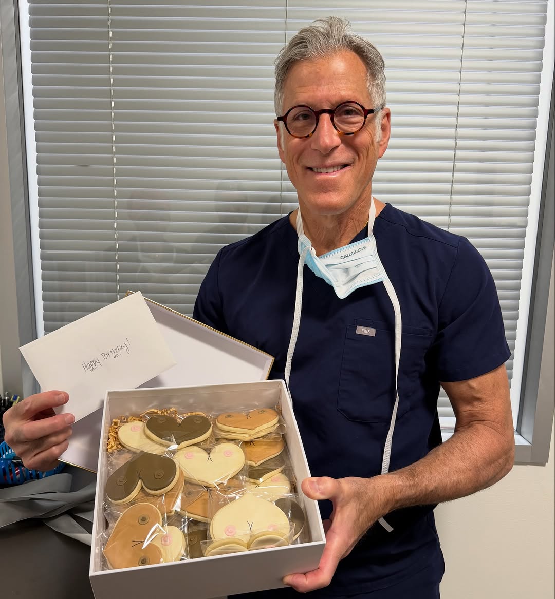 Instagram post by Dr. Michael D. Cohen: When your patients really understand your specialty🫶🏻 I got the most fitting birthday treat today! Grateful to do what I love every day—th…