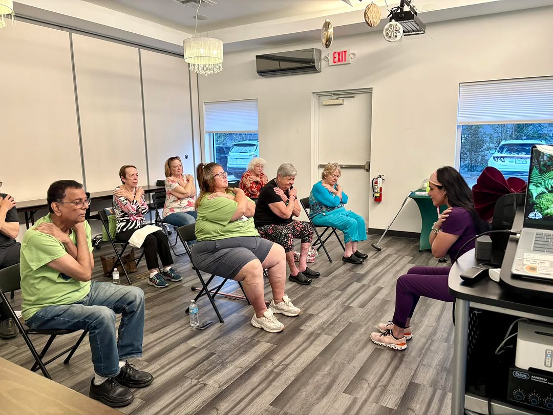 Instagram post by Dr. Mira Mahajan: Chair Yoga in full swing! Next class April 22 @ 1:00pm. Join us!