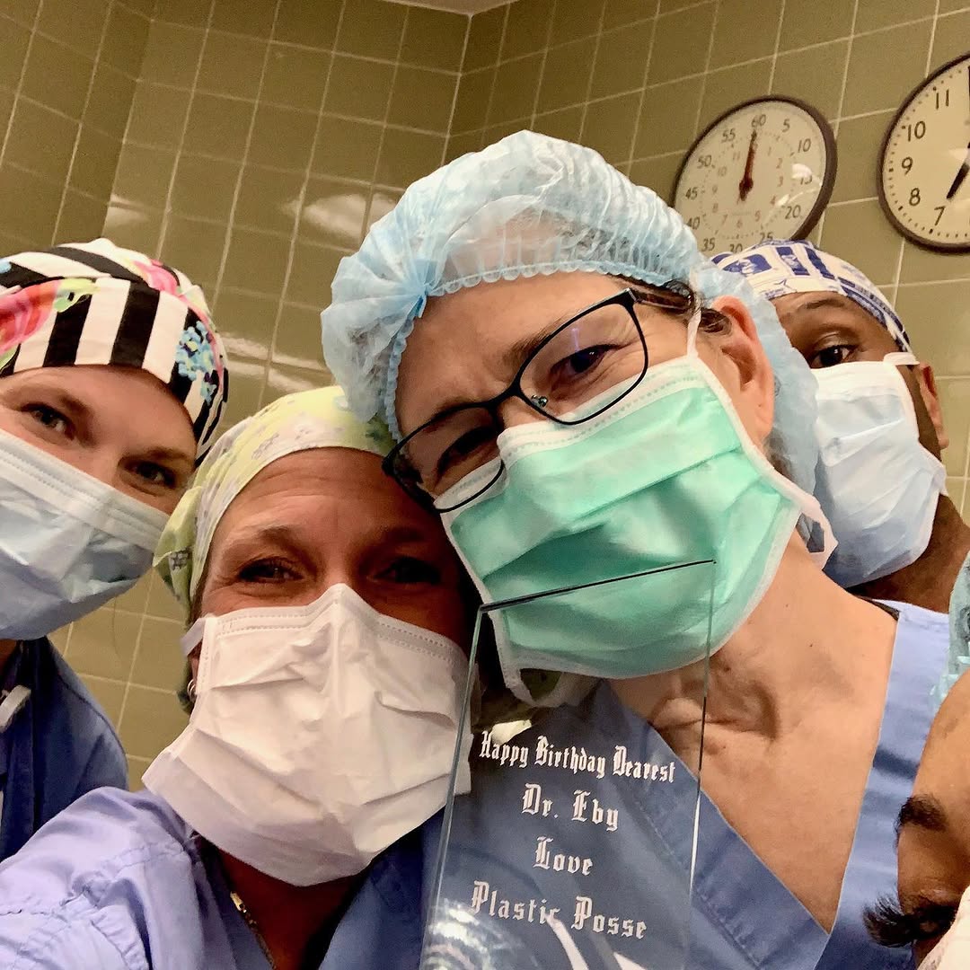 Instagram post by Dr. Patricia L. Eby: Our surgical team “The Plastic Surgery Posse” surprised me with a plaque and a delicious lemon cake for my birthday! They make going to work…