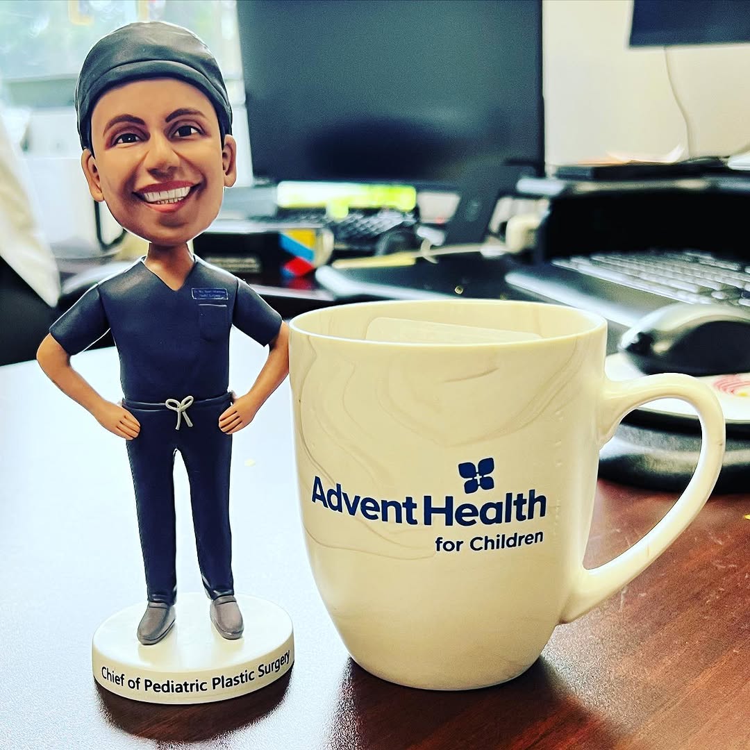 Instagram post by Dr. Raj Sawh-Martinez: Feels like a right of passage to become a bobble head. Thanks so much for this sweet bday gift hookup @villafradez_ 🙌🏽🙏🏽 #plasticsurgery…