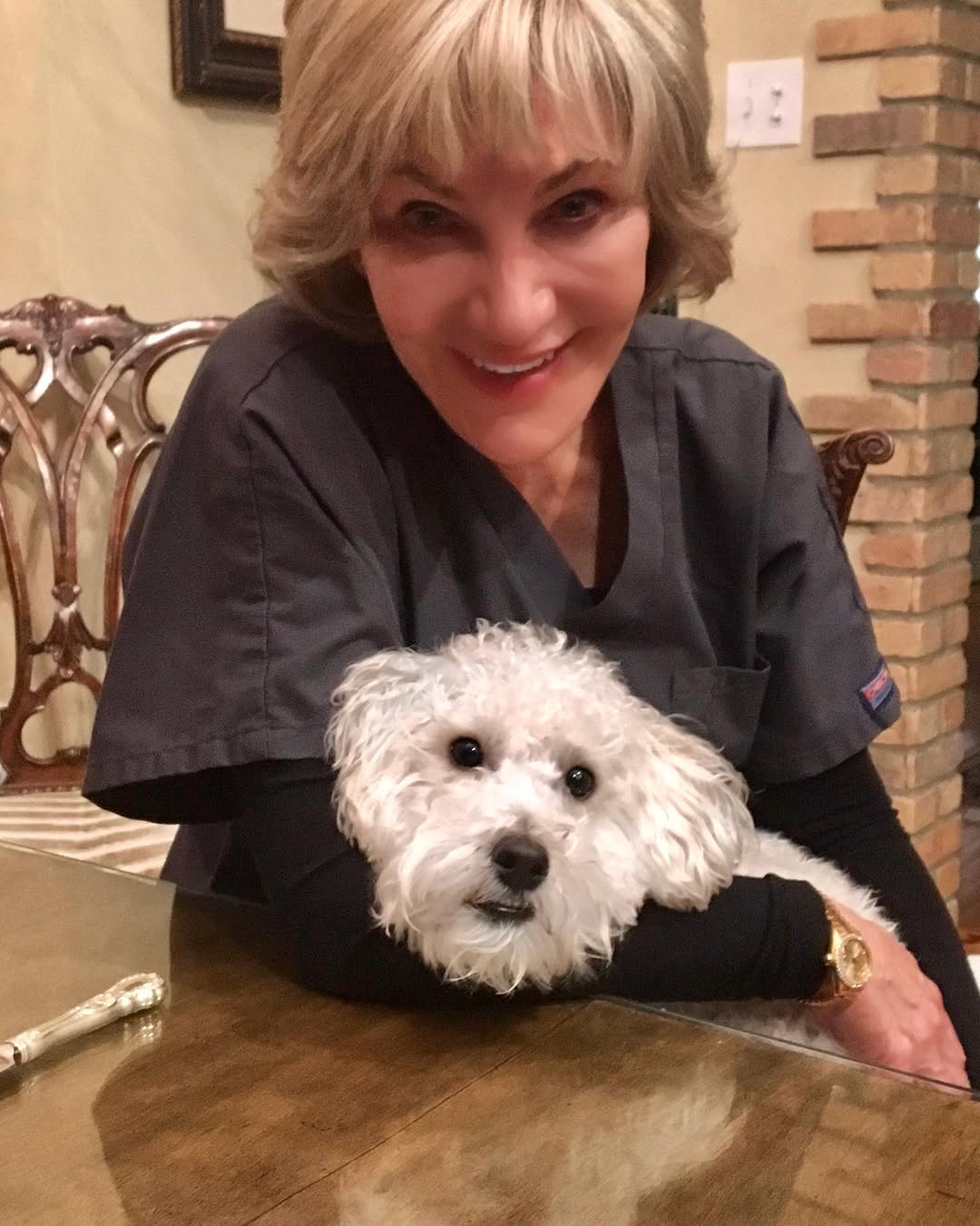 Instagram post by Dr. Ruth L. Hillelson: All you need is love and a dog! There is nothing in the world like coming home to this little guy. #dog #ilovemydog