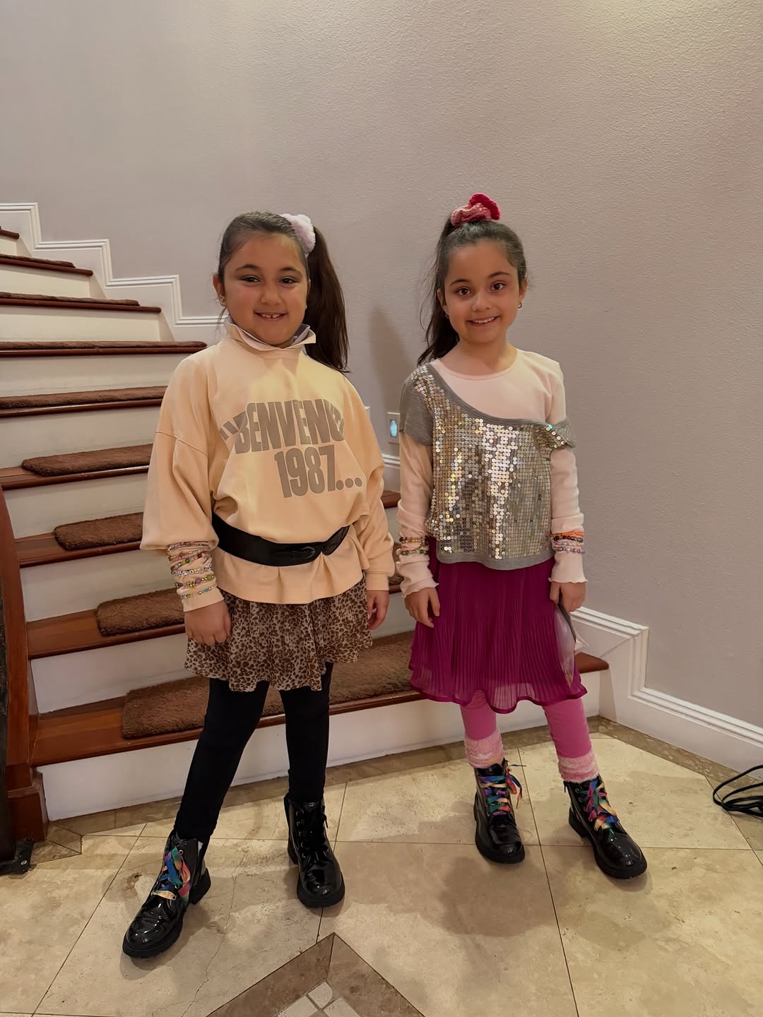 Instagram post by Dr. Ruwanthi Campano: Spirit week at school: Throwback Thursday. Yes, the twins are dressing up in mom’s clothes from her closet. Check out the 80s eyeshadow and …
