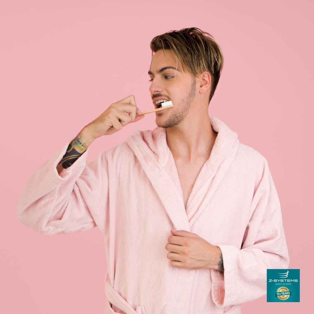 Instagram post by Dr. Santiago Lopez, DDS: On #NationalToothacheDay commit to brushing and flossing your teeth every day to maintain healthy gum tissue and teeth.⠀ .⠀ #ceramicimplants…