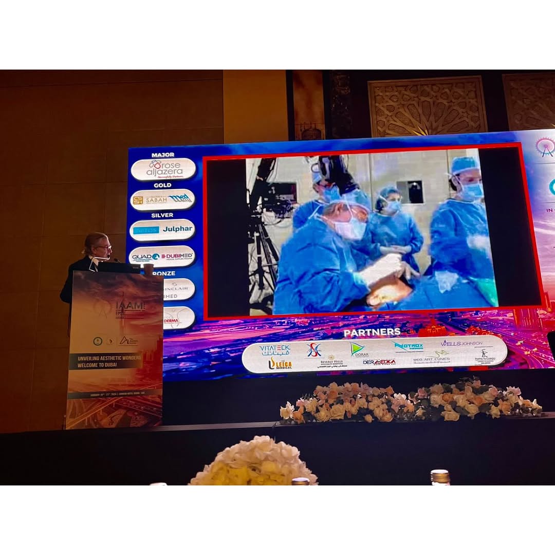 Instagram post by Dr. Sherrell J. Aston: Giving my first requested lecture at the 1st International American Aesthetic Surgery Symposium in Dubai to a filled room! (Swipe ⬅️ ). I sp…