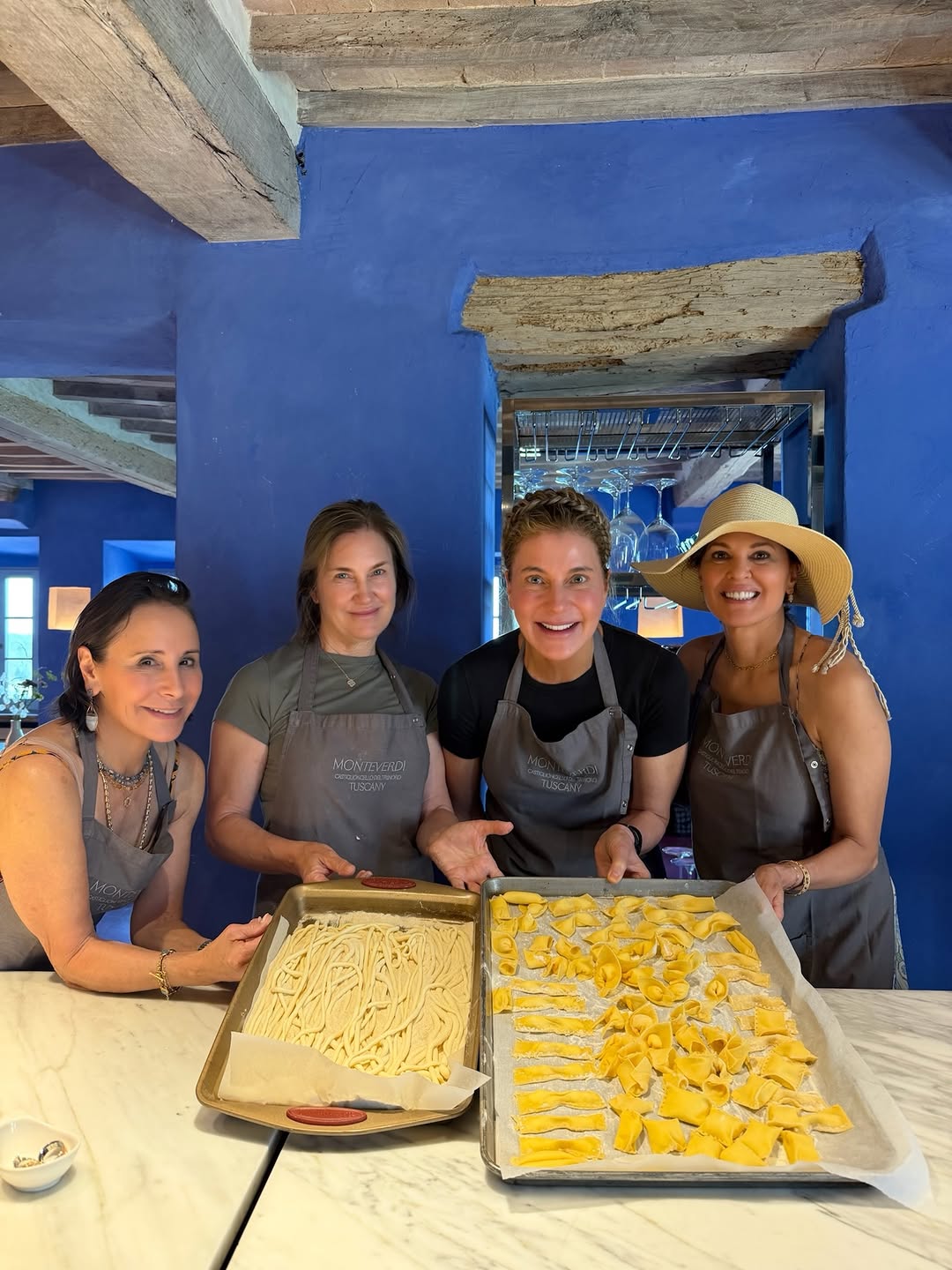 Instagram post by Dr. Sue Ellen Cox: Some of my favorite memories are made around a table. 🇮🇹❤️ A beautiful day in Tuscany with three very special friends—Sue Ellen Cox, Margu…