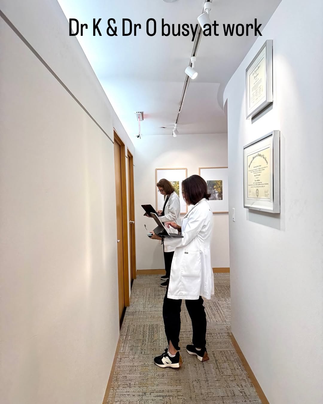 Instagram post by Dr. Sylvie Khorenian: In case you are wondering where our doctors are while you are changing or waiting in the exam room, they're right outside the door reading y…