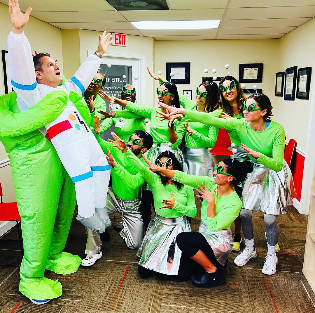 Instagram post by Dr. Timothy M. Bradley: Aliens have taken over POBAR! 👽 Happy Halloween 🎃 Costumes are highly encouraged for your appointments 😃