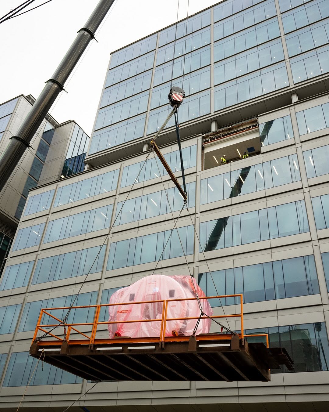 Instagram post by Dr. Vladlen Kim: It’s not every day you see an MRI fly six stories in the air. Crews installed the imaging system in our new Neurological Institute building.…