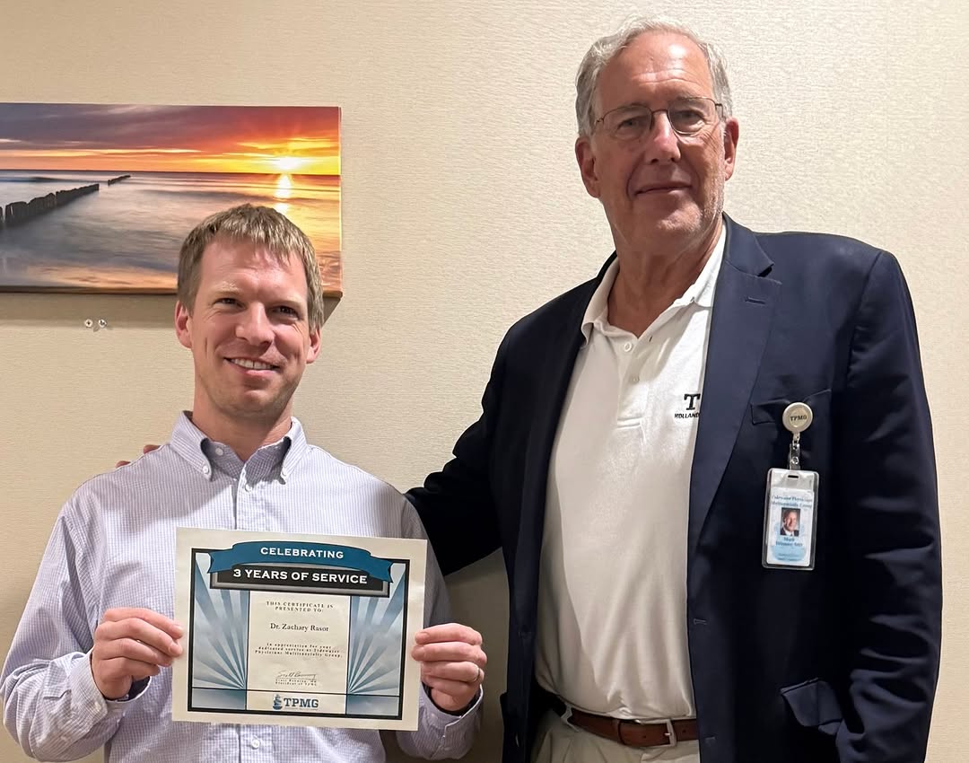Instagram post by Dr. William H. Brown, III: Dr. Zachary Rasor of TPMG Foot and Ankle in Virginia Beach received his TPMG 3-year Service Award from Dr. Mark Winters, TPMG Southside Medi…