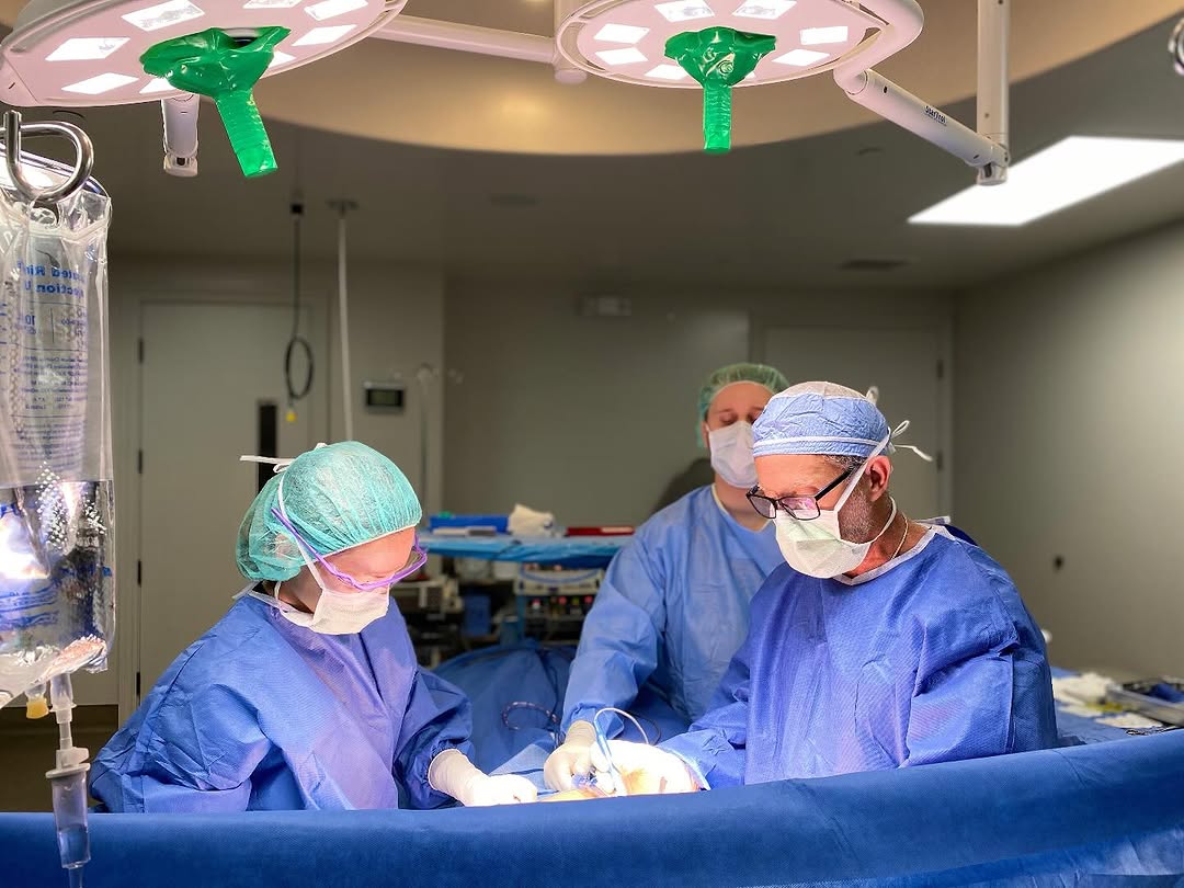 Instagram post by Dr. Zol Kryger: BTS in the OR with Dr. Kryger & Gisele Rohde, PA-C🥼precision in progress ✨stay tuned for the final results 👀😍 #dreamteam #operatingroom #…